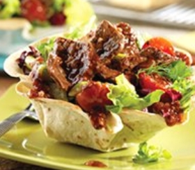 Stir-Fried Beef Salad in Tortilla Cups image